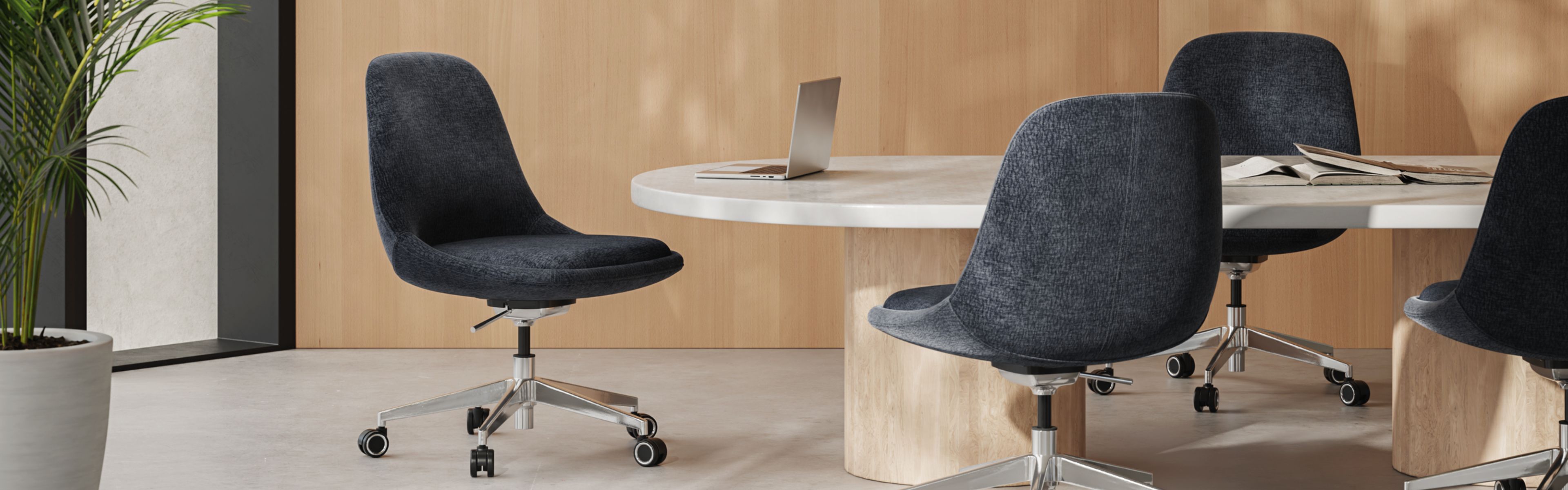 Mary conference chairs in Midnight on polished five-star bases around a meeting table