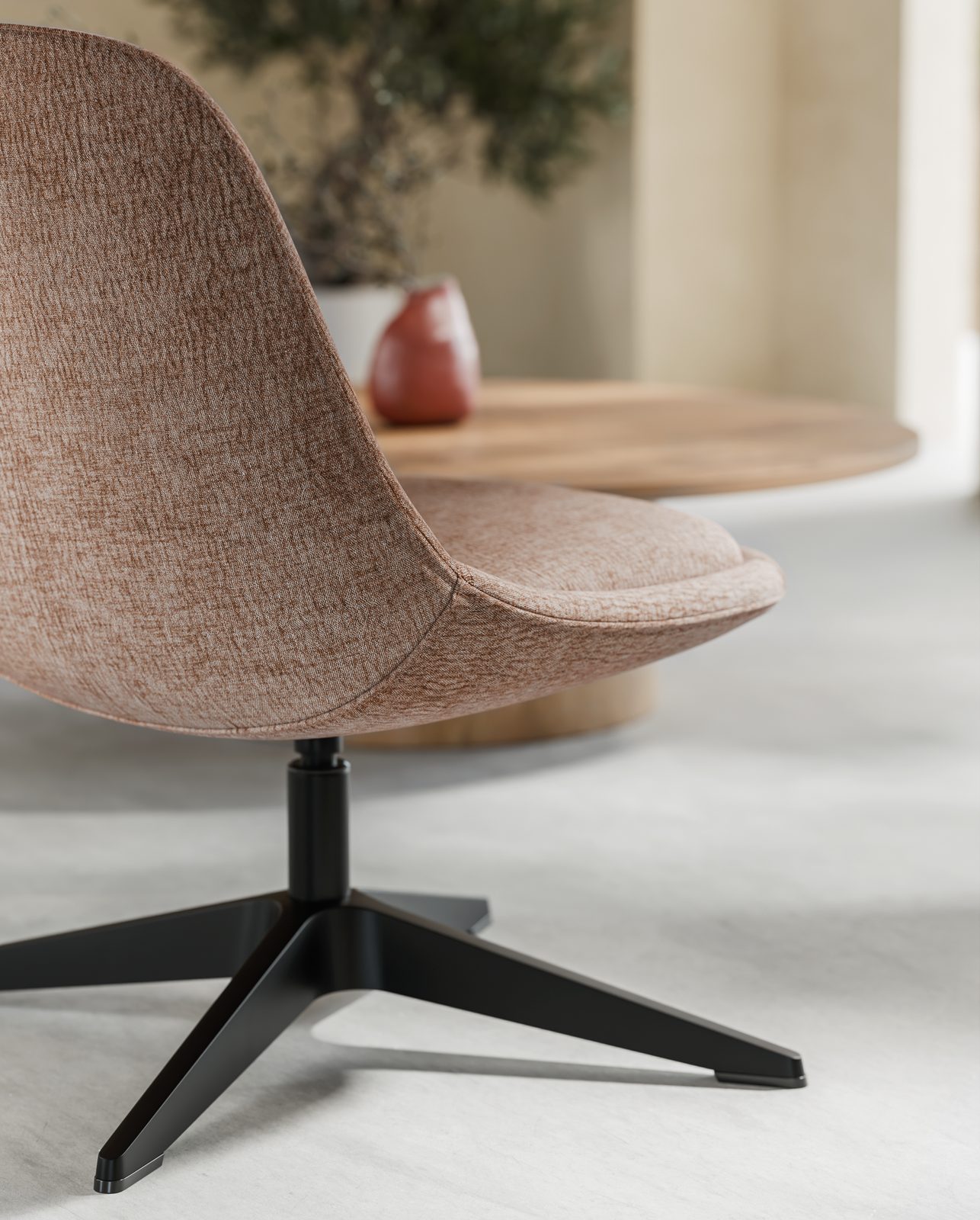 Mary swivel chair in Fawn on a black four-star base